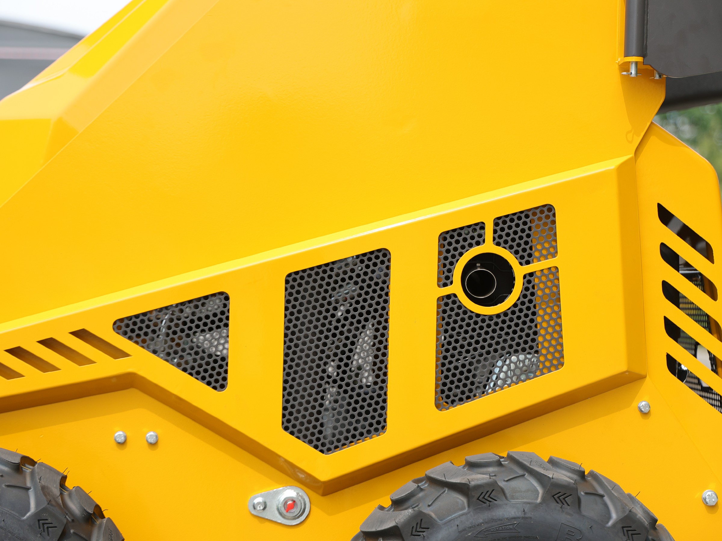 Close-up of the HY360W side panel, engine vents, and tire